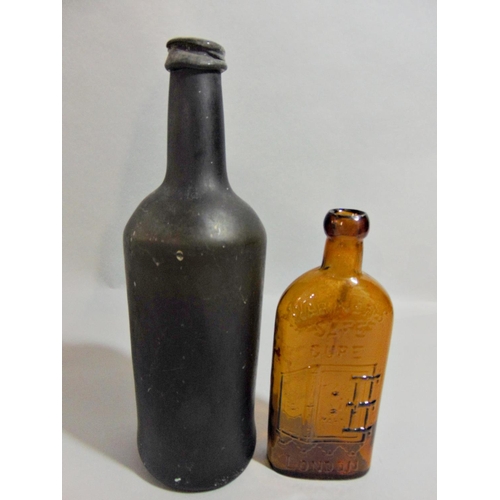 1133 - Warners Safe Cure of London brown glass bottle, 29 cm high, together with a further early glass bott... 