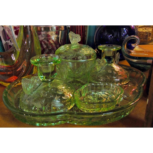 1134 - Mixed collection of coloured glass to include Mdina glass dish, further green glass dressing table s... 