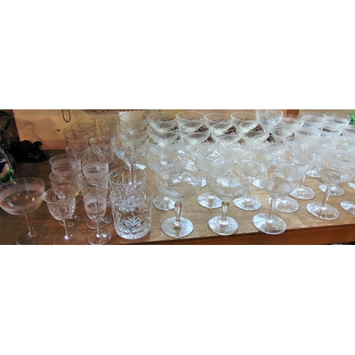 1153 - Large collection of Edwardian and later glass flutes, champagnes, tumblers, goblets, etc, various se... 