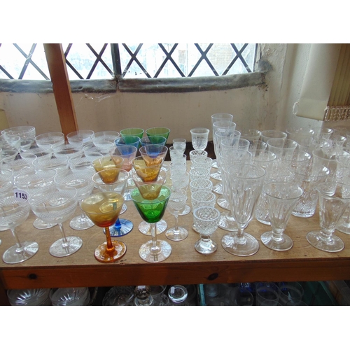 1153 - Large collection of Edwardian and later glass flutes, champagnes, tumblers, goblets, etc, various se... 