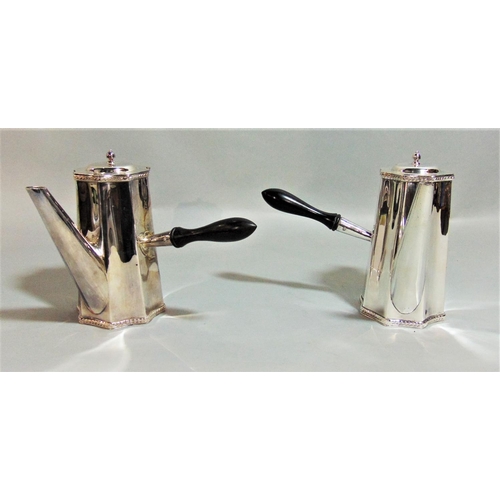 1171 - Pair of Regency style Sheffield plated chocolate pots of tapered faceted form with turned ebony hand... 