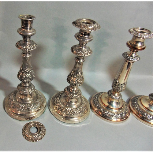 1176 - Pair of antique good quality Sheffield plated candlesticks, the baluster columns with cast acanthus ... 