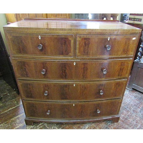 2747 - A good quality Maple & Co mahogany bow fronted chest of three long and two short drawers in the Rege... 