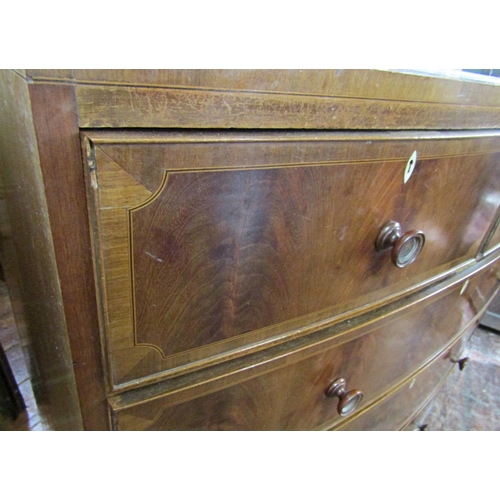 2747 - A good quality Maple & Co mahogany bow fronted chest of three long and two short drawers in the Rege... 