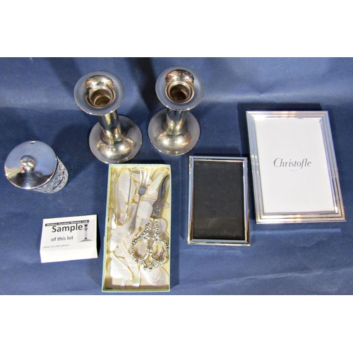 1175 - Mixed collection of silver plate to include four photograph frames, a pair of candlesticks, a silver... 