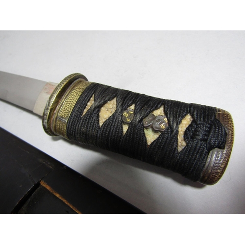 1511 - A Japanese Tanto with black lacquered Saya, the blade 21cm, 34cm overall, not signed