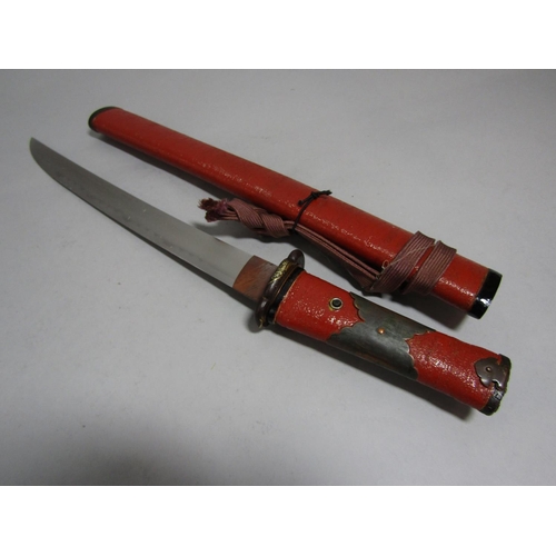 1512 - A Japanese Itomaki Tanto with red lacquered finish, the Tang unsigned, the blade 26cm, 40cm overall