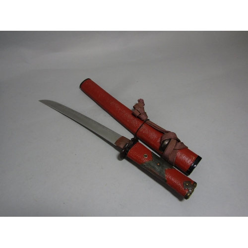 1512 - A Japanese Itomaki Tanto with red lacquered finish, the Tang unsigned, the blade 26cm, 40cm overall