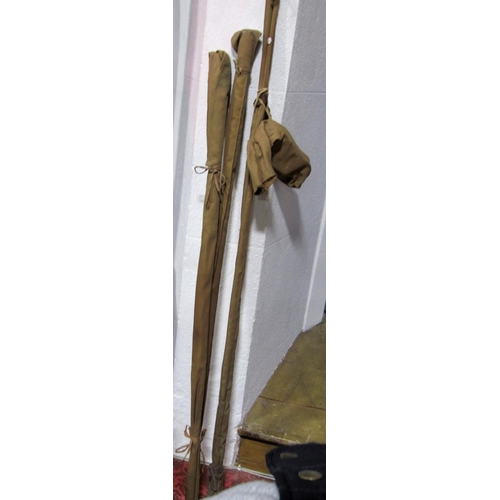 536 - Vintage split cane fishing rods and two reels