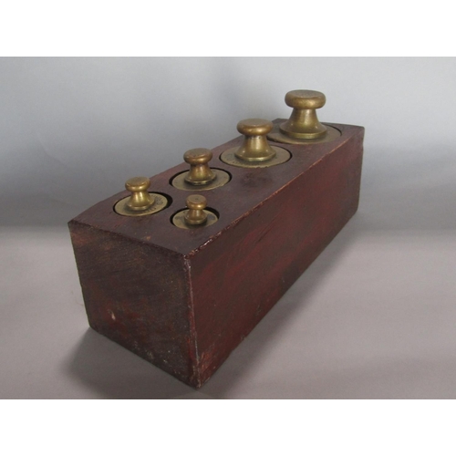 575 - Set of Ibrasco weighing scales, together with two graduated sets of brass weights fitted with mahoga... 