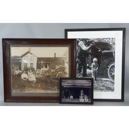 306 - An early 20th century sepia coloured photograph of an American family seated outside their house wit... 