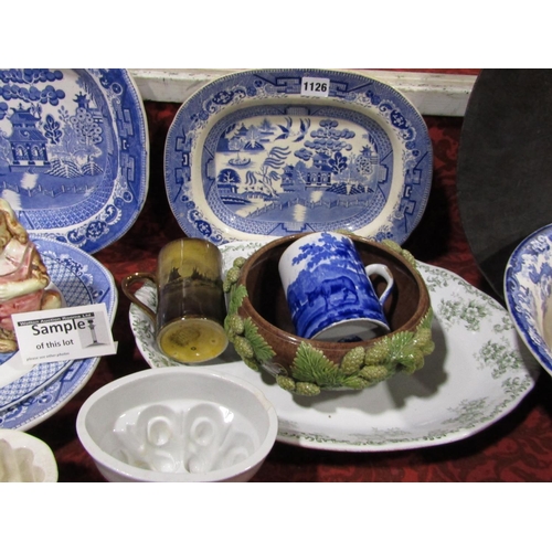 1126 - A collection of 19th century and later ceramics including blue and white meat plates, blue and white... 