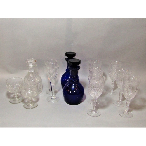 1166 - Pair of possibly Bristol Blue glass decanters, 26cm high, together with a good quality set of six go... 