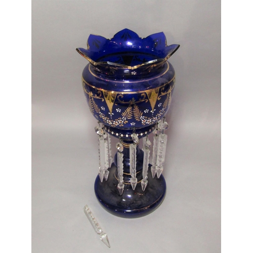 1169 - Late 19th century blue glass lustre with gilt and enamelled overlay, 37cm high (some drops vacant)