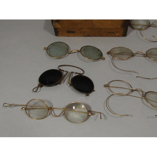 1510 - A collection of vintage gold rimmed spectacles