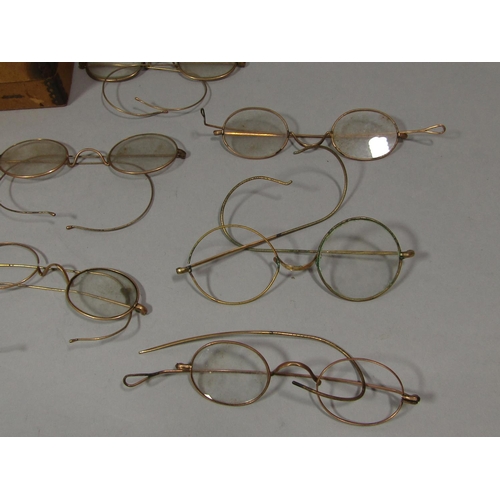 1510 - A collection of vintage gold rimmed spectacles