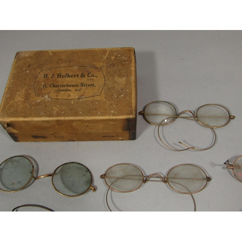 1510 - A collection of vintage gold rimmed spectacles