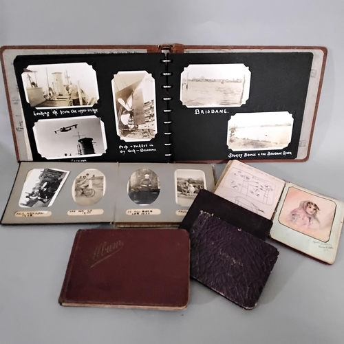 91 - A mixed collection of ephemera to include a quantity of mixed postcards, photograph albums, a leathe... 