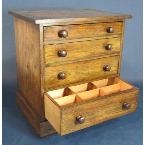 578 - Mahogany apprentice or table top chest of drawers fitted with four long graduated drawers, 32cm high