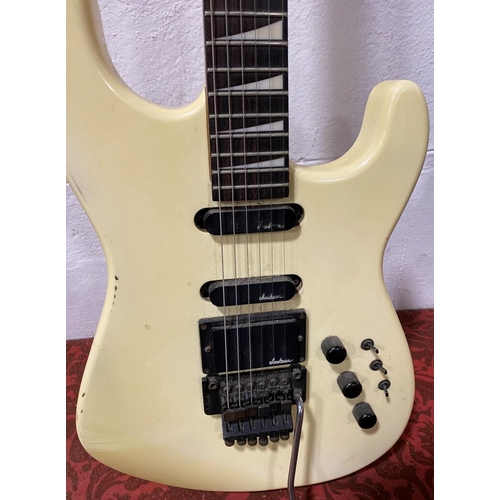 586 - Jackson Charvel soloist style 6 string electric guitar in cream, 97cm full length 50cm fretboard, to... 