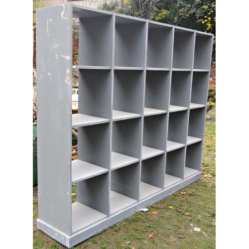 2050 - A painted floorstanding pigeon hole open fixed shelving unit, 209cm wide x 40cm deep x 171cm high to... 