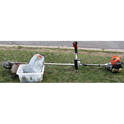 2067 - A Stihl FS90 petrol driven brush cutter and accessories