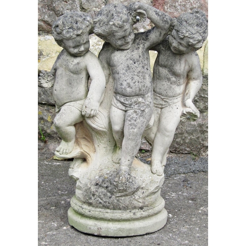 2088 - A reclaimed garden ornament/water feature in the form of three frolicking cherubs beside a tree stum... 