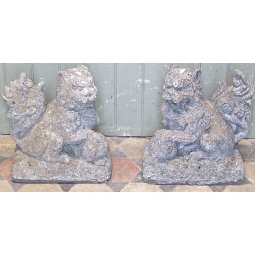 2090 - A pair of reclaimed garden ornaments or caps in the form of Chinese Dogs of Fo, with seal marks, 36c... 