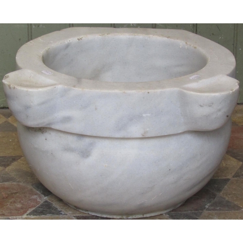 2092 - A white marble and grey flecked basin of circular form with slightly dished lugs, approx 50cm diamet... 