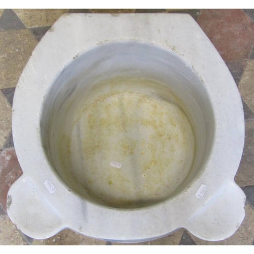 2092 - A white marble and grey flecked basin of circular form with slightly dished lugs, approx 50cm diamet... 