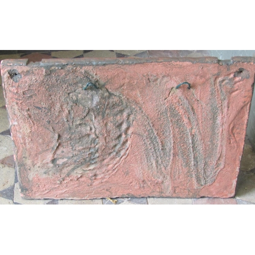 2093 - A reclaimed heavy wall mounted raised relief tablet of a mythical standing winged lion, clutching an... 