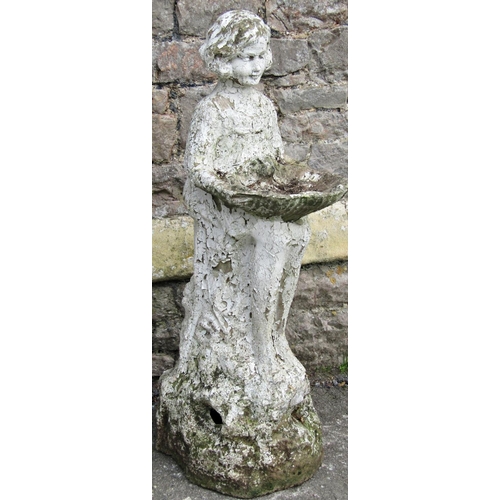 2107 - A reclaimed bird bath with weathered painted finish in the form of a girl seated on a tree stump and... 