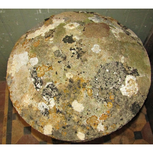 2118 - A weathered natural stone staddle stone of usual square tapered form beneath a domed cap, approximat... 