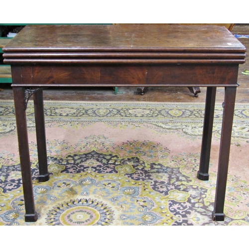 2720 - A Georgian mahogany deep double fold over tea and card table of rectangular form raised on square cu... 