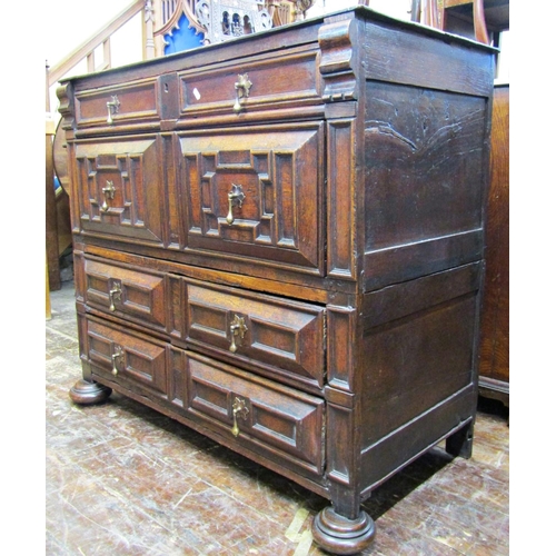 2731 - Late 17th century oak two sectional chest of drawers enclosed by four long drawers presented as eigh... 