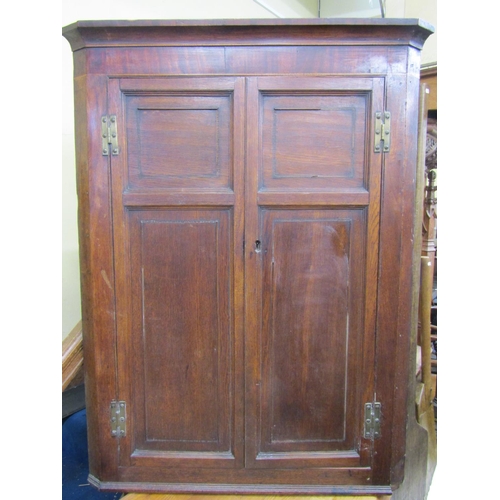 2765 - A Georgian oak hanging corner cupboard with barrel back and simply fitted interior, 80 cm wide x 30 ... 