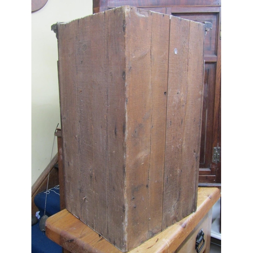 2766 - A small 18th century oak hanging  corner cupboard with panelled door and set beneath a dentil frieze... 