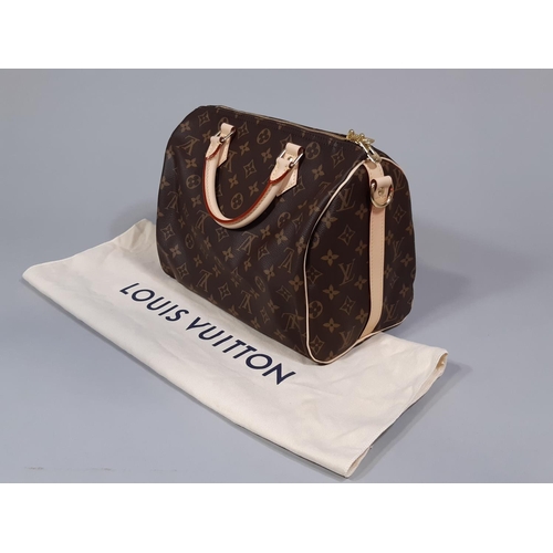 1557 - Louis Vuitton 'Speedy 30 Bandouliere' bag (2021) in monogrammed canvas with pale leather trim and st... 