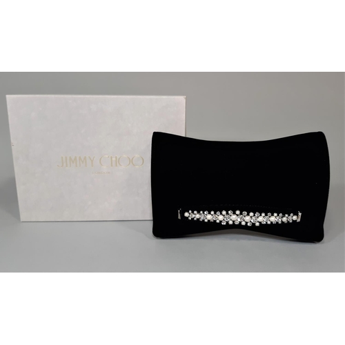 1560 - Jimmy Choo 'Venus' clutch bag in black velvet with crystal embellished bracelet strap at front, inte... 