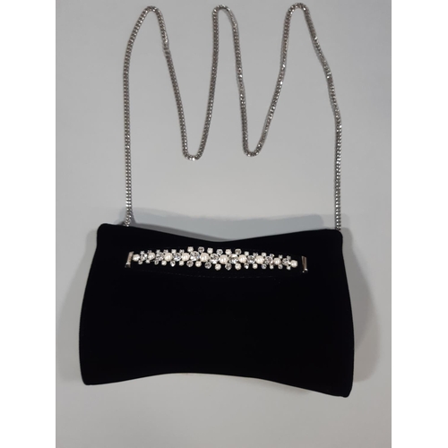 1560 - Jimmy Choo 'Venus' clutch bag in black velvet with crystal embellished bracelet strap at front, inte... 