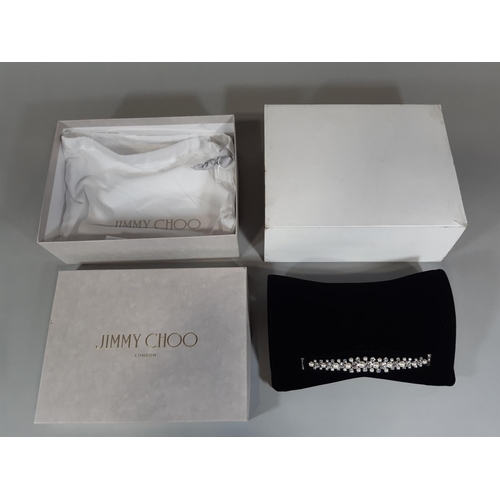 1560 - Jimmy Choo 'Venus' clutch bag in black velvet with crystal embellished bracelet strap at front, inte... 