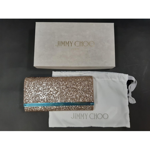 1561 - Jimmy Choo glitter clutch bag with all original interior tissue packaging, cloth bag and box. Unused... 