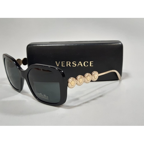 1563 - 3 pairs of designer sunglasses by Versace, Jimmy Choo and Calvin Klein, all cased and unused