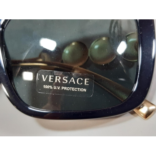 1563 - 3 pairs of designer sunglasses by Versace, Jimmy Choo and Calvin Klein, all cased and unused