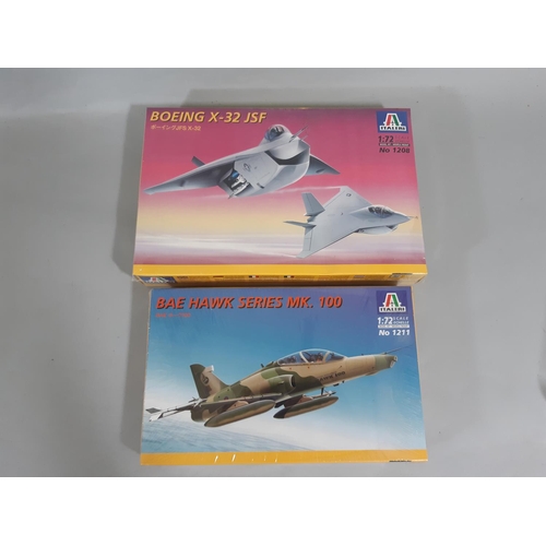 77 - 7 model aircraft kits, all 1:72 scale models of jets,  appear to be un-started, some in sealed cello... 