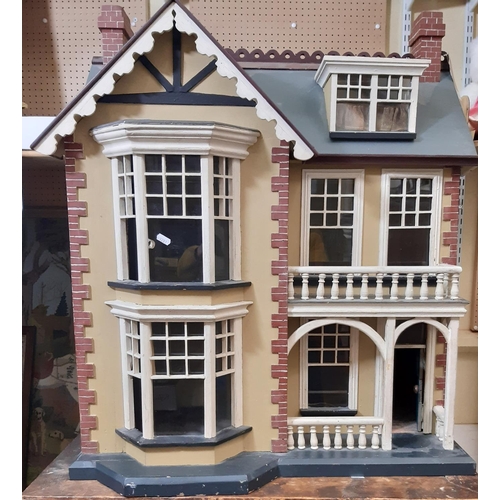 78 - Impressive vintage wooden dolls house in the style of a Victorian town house  with painted finish, a... 