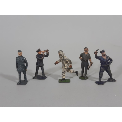 82 - A collection of lead figures, some with 'Britains' mark, including WW1 soldiers, Scottish Guards, Mo... 