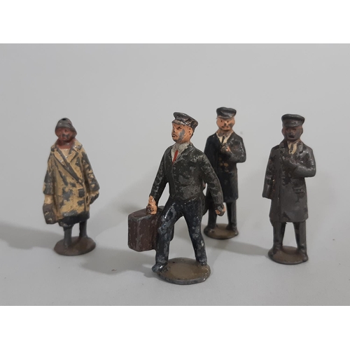 82 - A collection of lead figures, some with 'Britains' mark, including WW1 soldiers, Scottish Guards, Mo... 