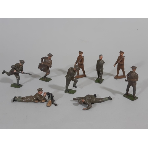 82 - A collection of lead figures, some with 'Britains' mark, including WW1 soldiers, Scottish Guards, Mo... 