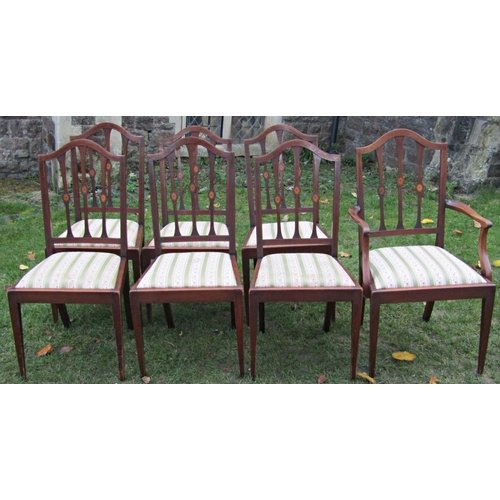 2166 - A set of seven (6&1) Edwardian dining chairs with slender inlaid splats over drop in upholstered sea... 